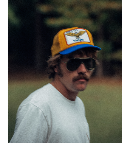 CHERRY LOS ANGELES X WRANGLER BORN INUS TRUCKER HAT YELLOW/BLUE